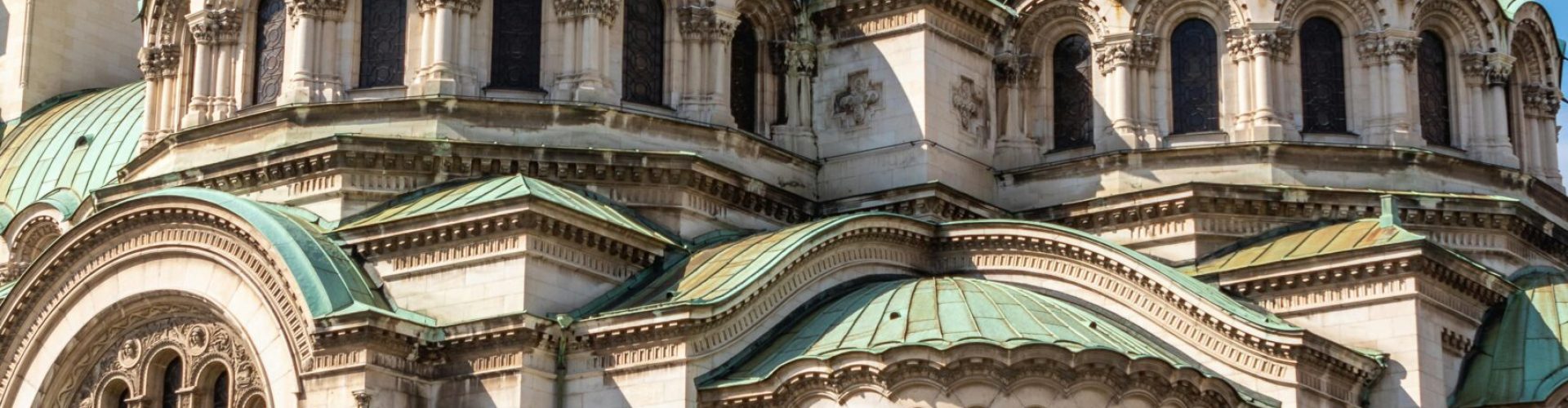 Bright day view of the Alexander Nevsky Cathedral showcasing its striking architecture in Sofia, Bulgaria.